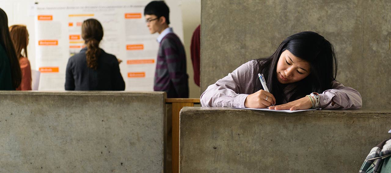 A student filling out paperwork