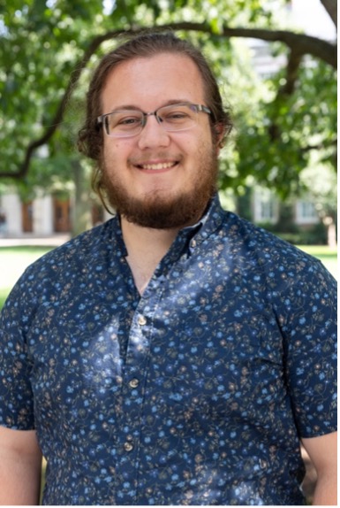 Tristan standing in front of Lattimore Hall.