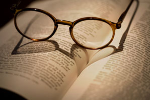 Eye Glasses on an Open Book
