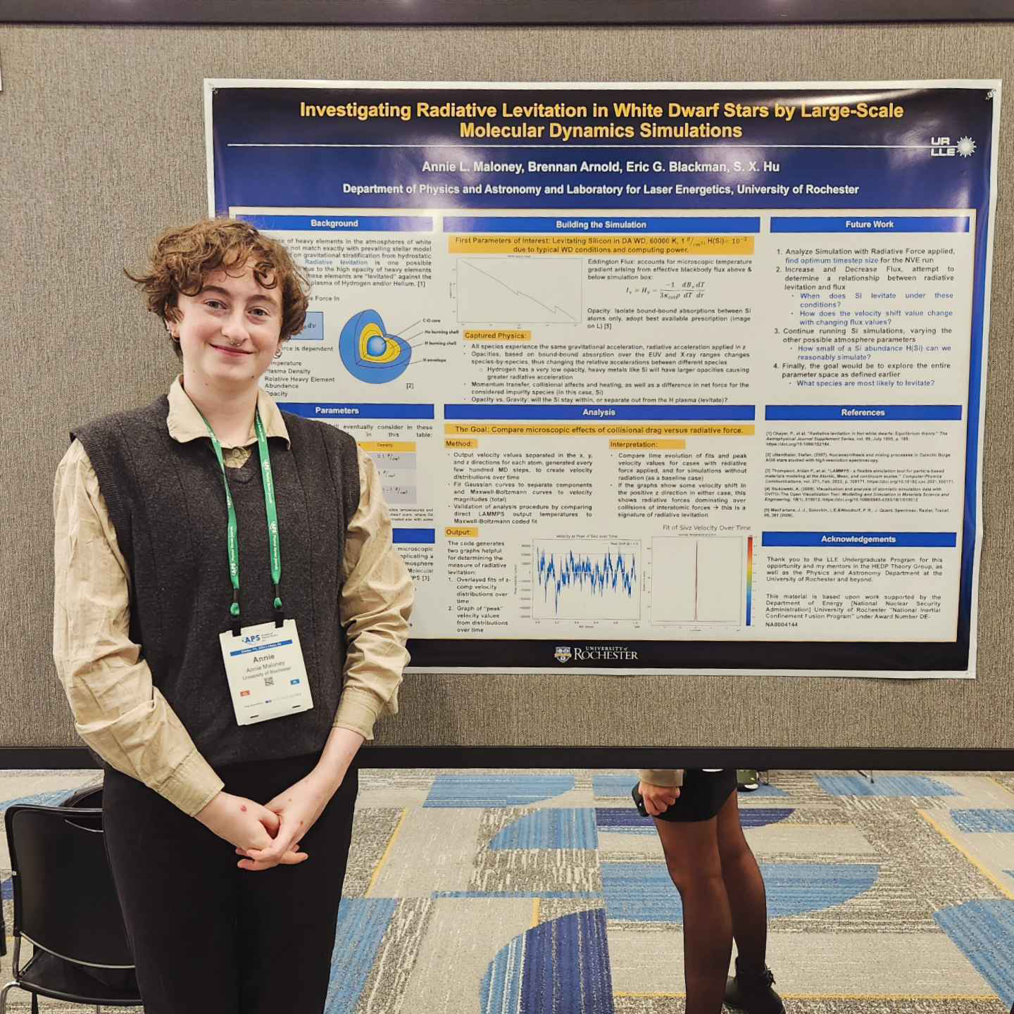Maloney with poster