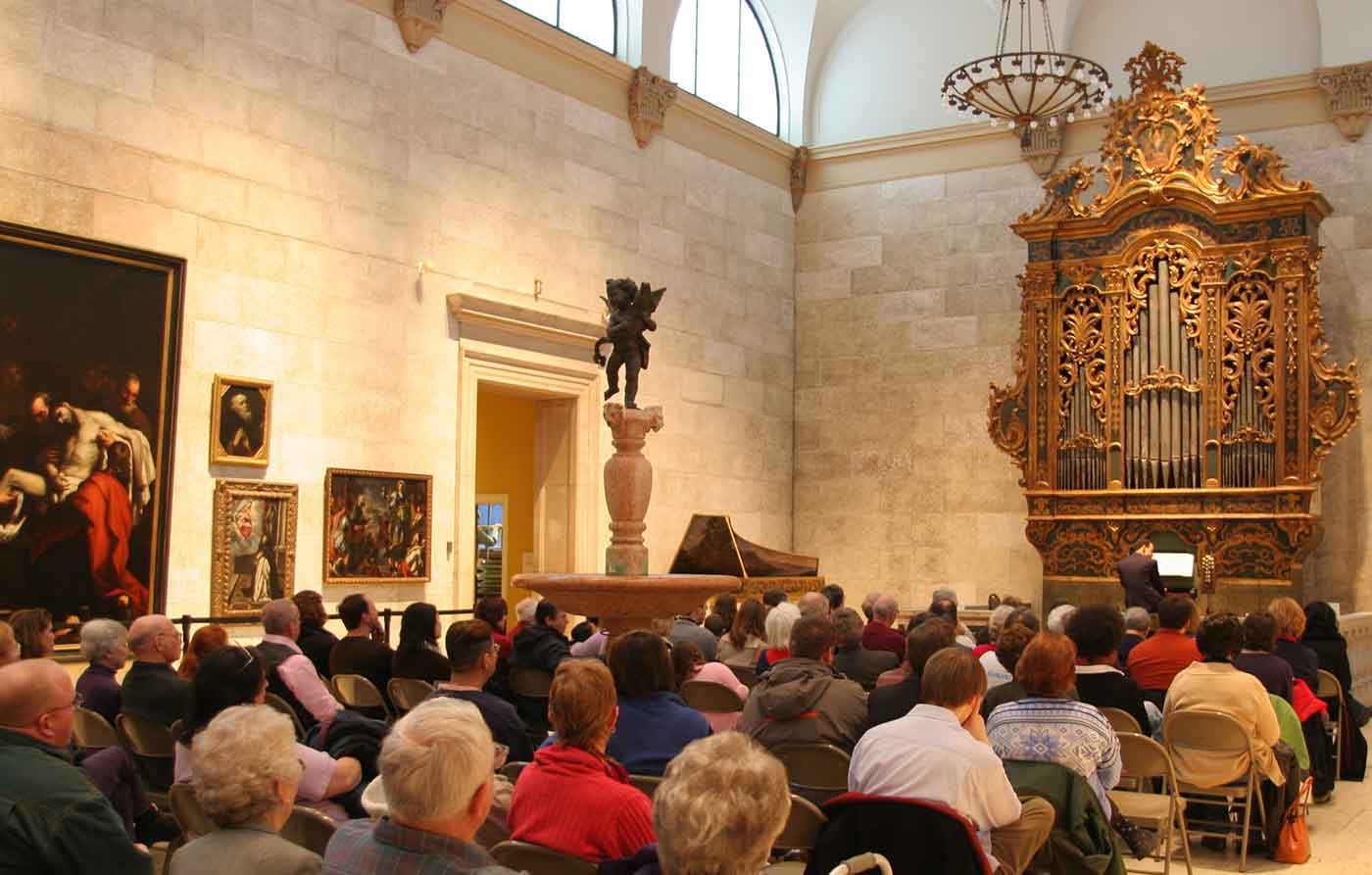 people listening to organ music