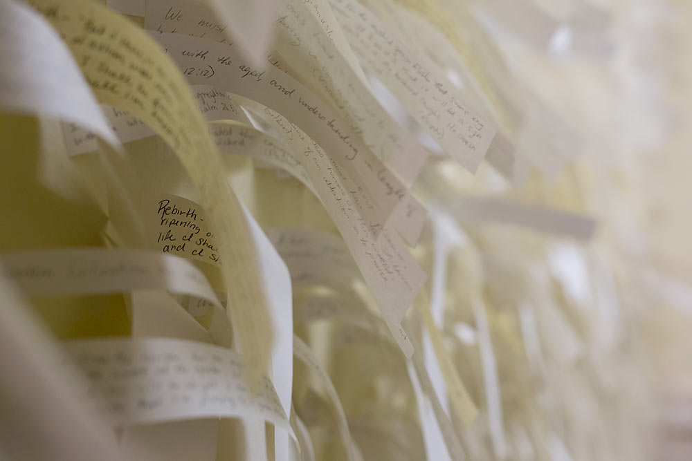 strands of inspirational messages adorn a wall of one room.