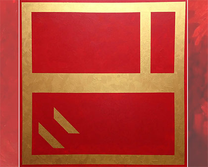 gold foil lines on a red backdrop