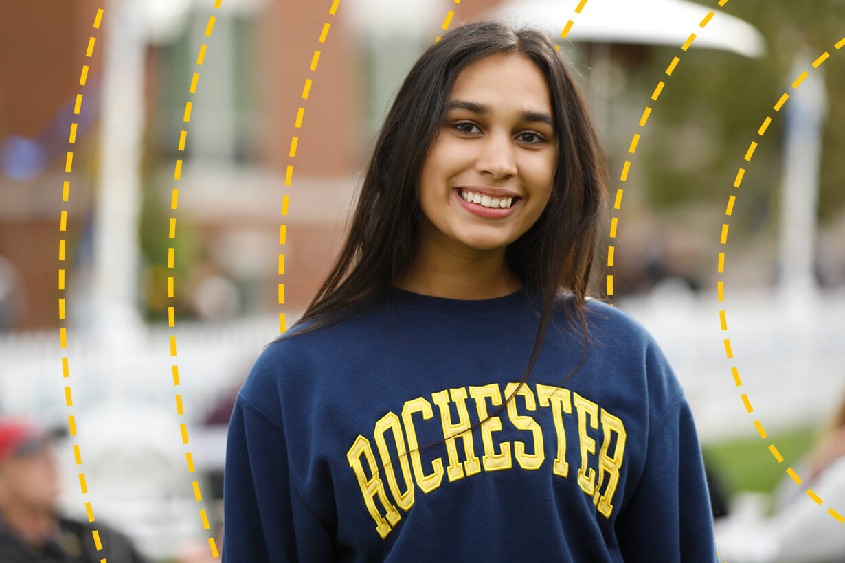 University of Rochester student poses for a photo on campus.