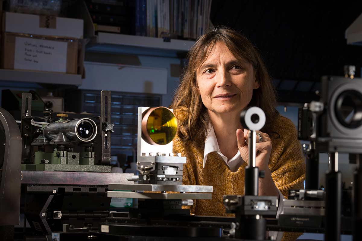 Jannick Rolland in a lab with optical devices