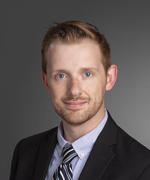 Sean Watson's headshot.