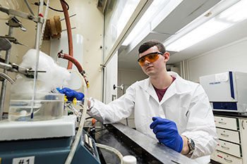 Chemical engineering student working in a lab