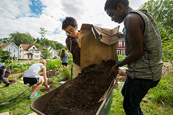 Students working in a community garden
