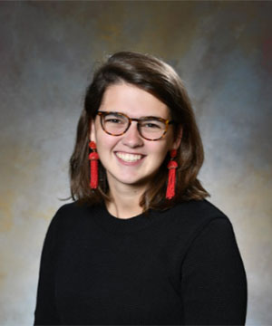 Headshot of Mackenzie Sherwood.