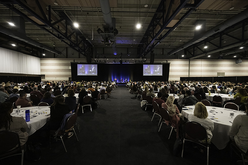 A conference room filled with people.