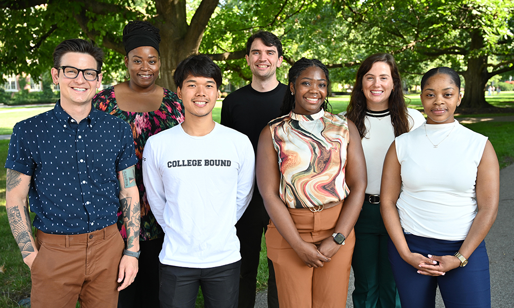 A group smiling at the camera.