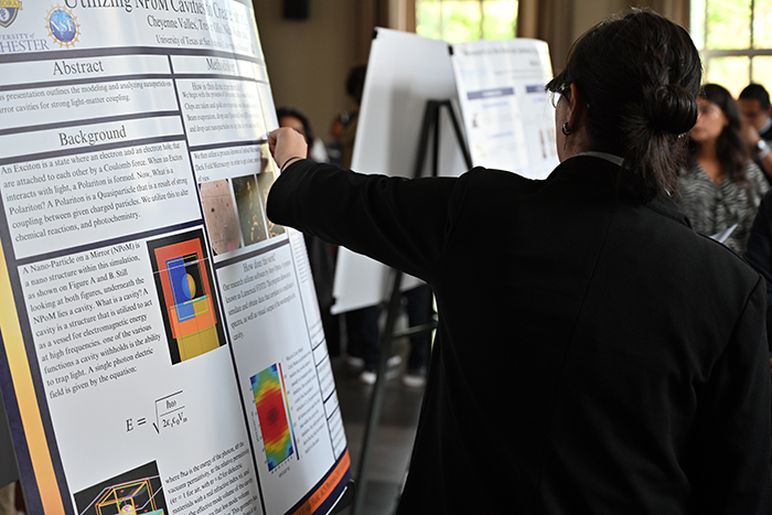 A student talking about their poster.