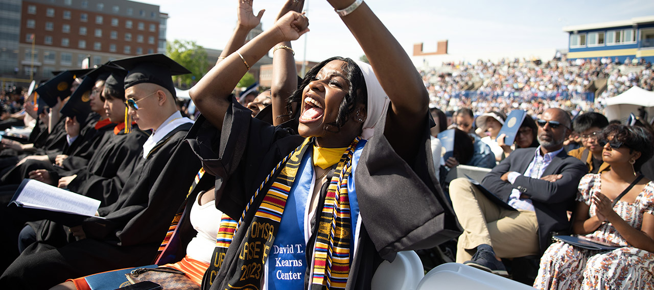 A Kearns Center student celebrating at commencement.