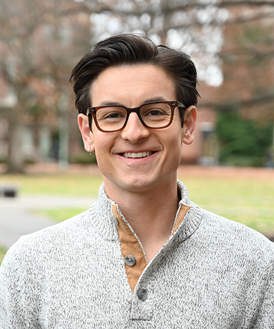 Headshot of Ben Godfrey.
