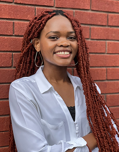 Headshot of Nyasha Gwaza.