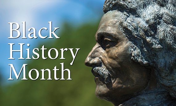 Statue of Frederick Douglass in profile looking toward text that reads "Black History Month."