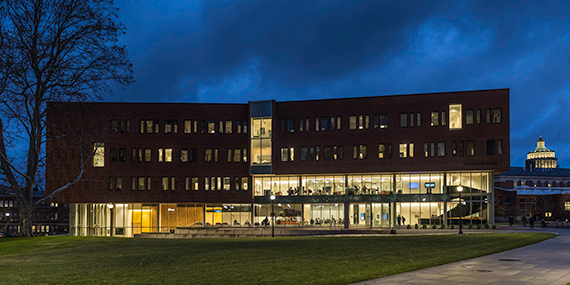 A view of Wegmans Hall at night.