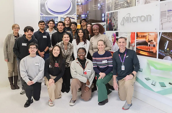 A group of 14 EDGE Scholars at the Micron Technology fabrication facility.