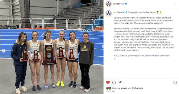 Members of the Rochester women's track and field team hold National Championship hardware