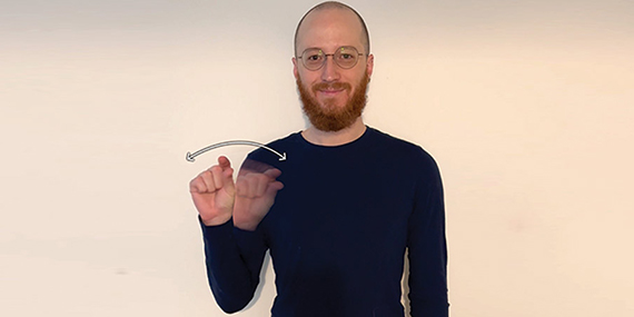 David Spiecker shows the ASL term for "quantum."