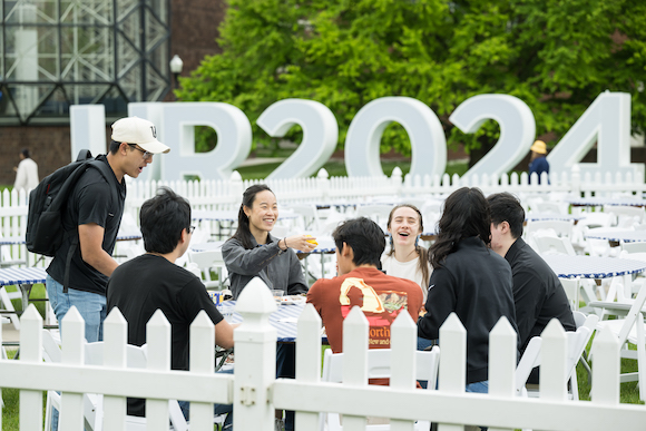 Seniors of the class of 2024 enjoy a picnic on Wilson Quad