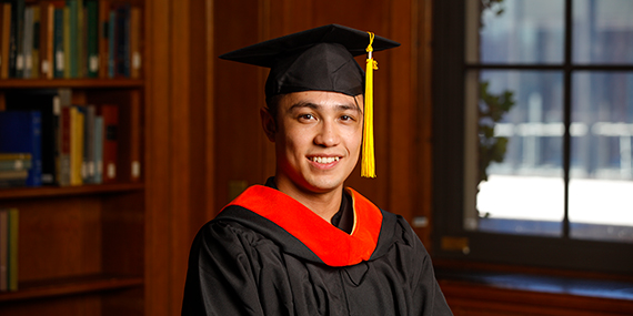 Ebdan Watt wearing a graduation cap and gown.
