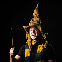 student wearing Harry Potter sorting hat