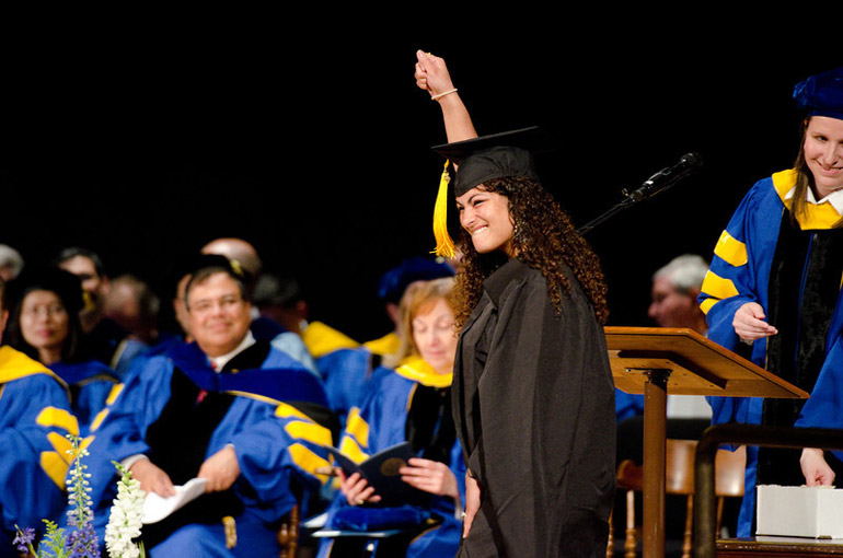 graduates on stage