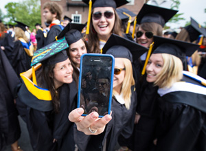 graduating students take self-portrait with iPhone