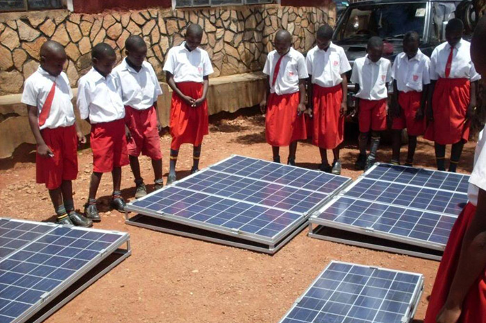 African students and solar panels