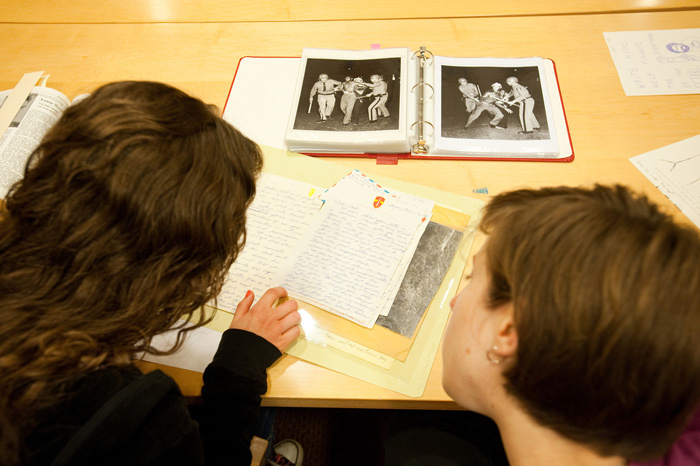students study a letter