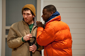 two men in coats