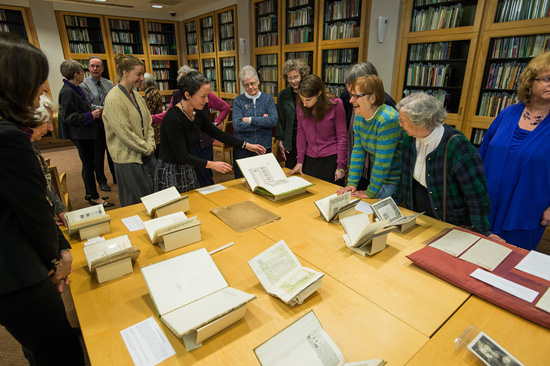 people look at books in library