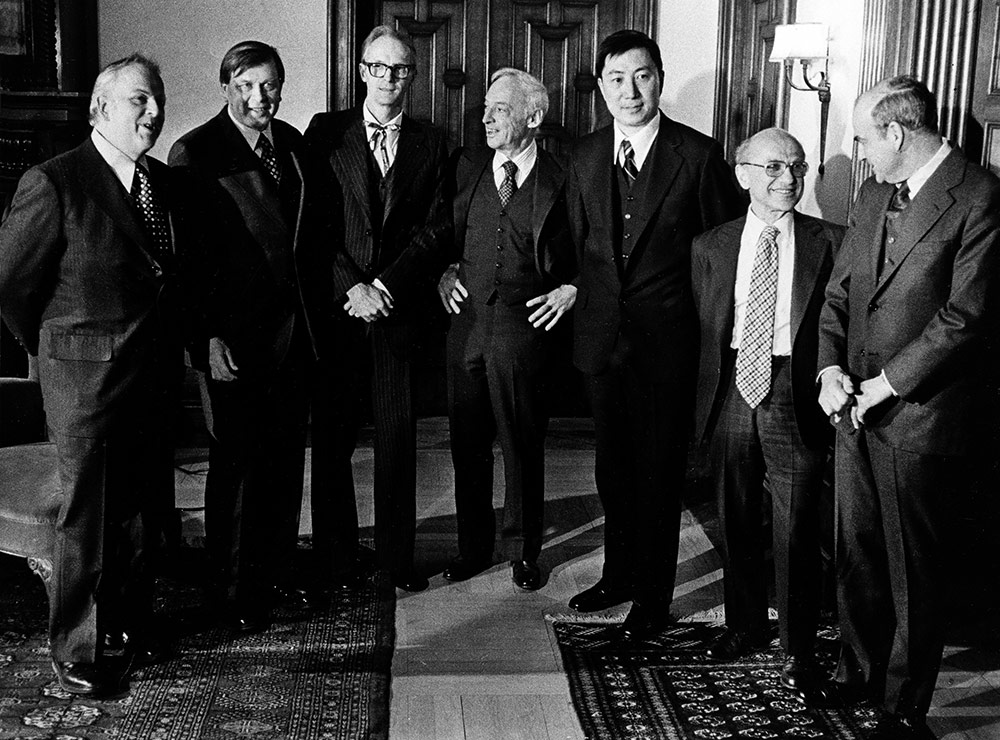 black and white photo of group of men