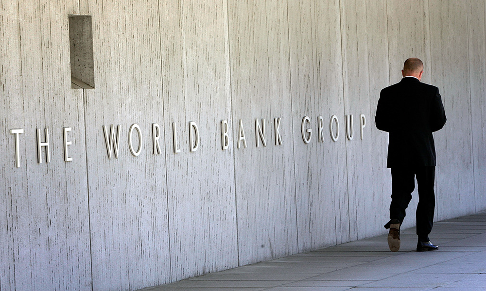 man walking outside World Bank headquarters