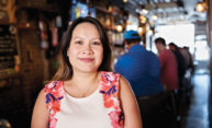 person poses for a photo at a New York City restaurant