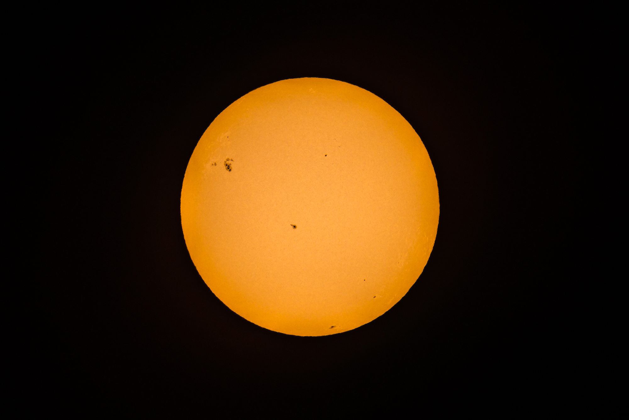 The sun photographed over the University of Rochester River Campus