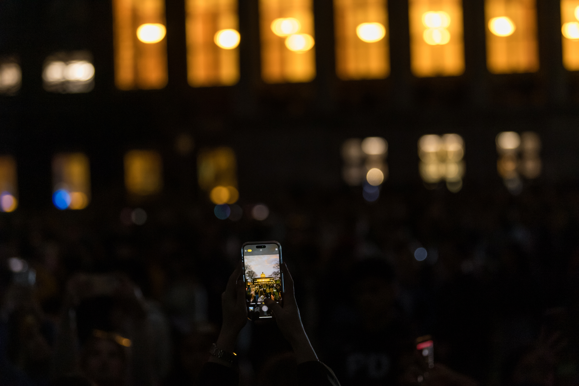 Rush Rhees Library seen through a cell phone during a moment of totality in a total solar eclipse