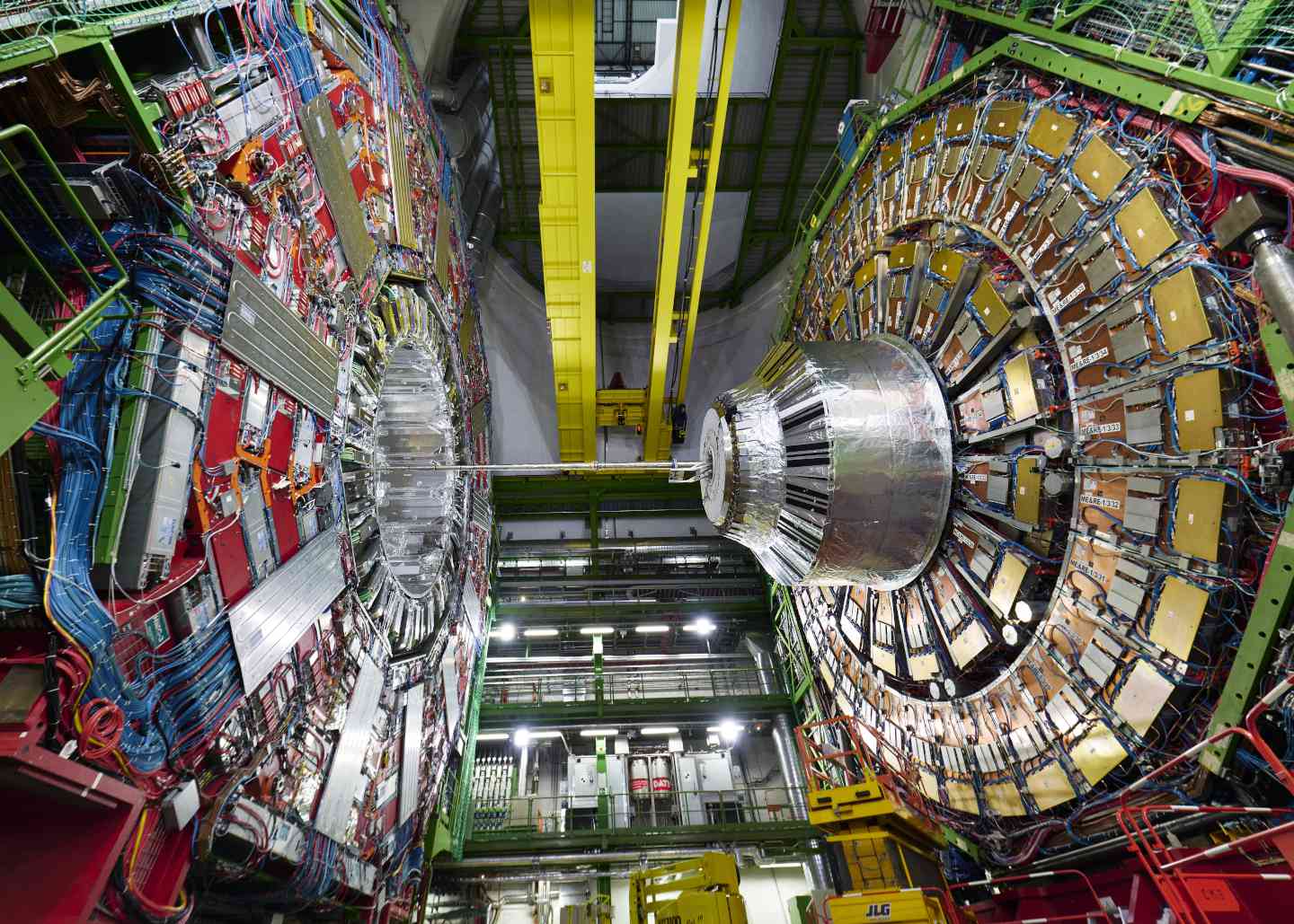 Side view of the Compact Muon Solenoid at CERN's Large Hadron Collider, used to measure the electroweak mixing angle, a component of the Standard Model of Particle Physics.