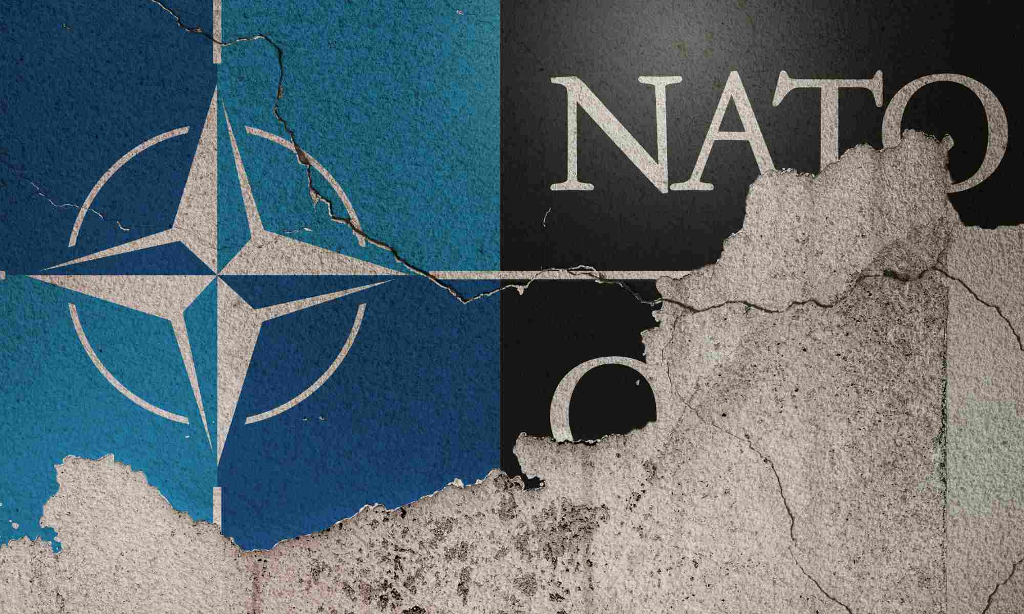 Illustration of the design of the NATO logo and acronym on cracked and distressed concrete. 