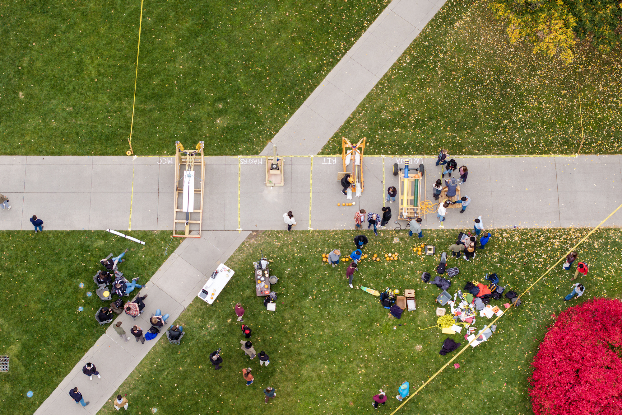 As seen from above, students shoot pumpkins across Wilson Quad 