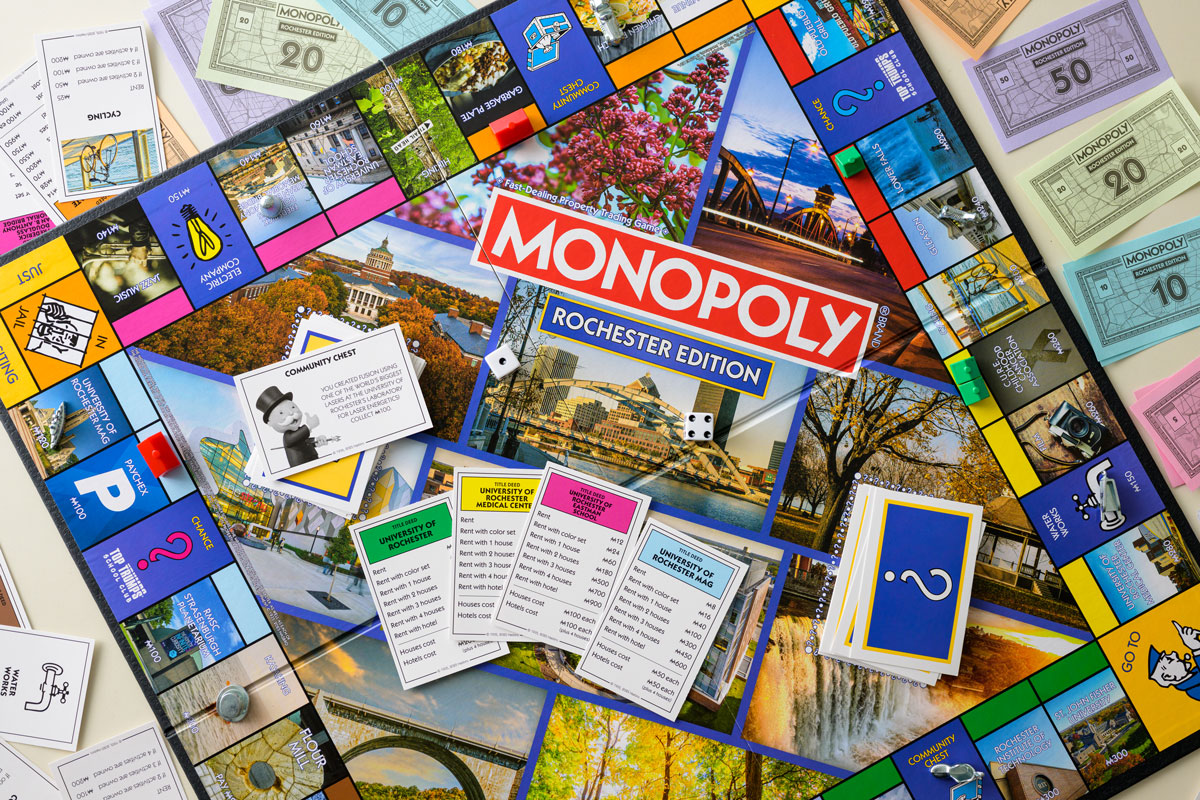 A Monopoly board featuring various game pieces, including tokens, houses, and hotels, arranged across the colorful squares.