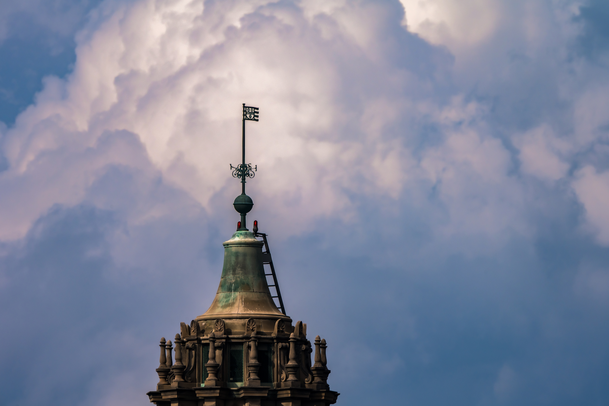 Storm clouds roll past University of Rochester’s Rush Rhees Library.