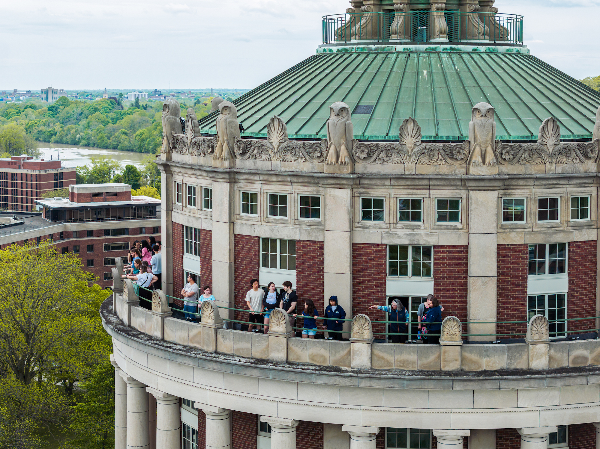 University of Rochester graduates tour Rush Rhees Library Tower. 