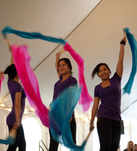 chinese student group waving colorful scarves