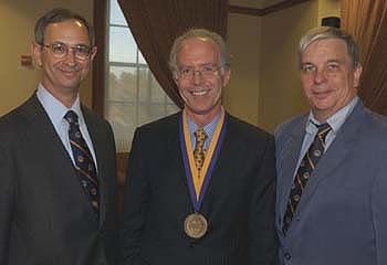 President Joel Seligman, Thomas Jackson, and Provost Charles Phelps