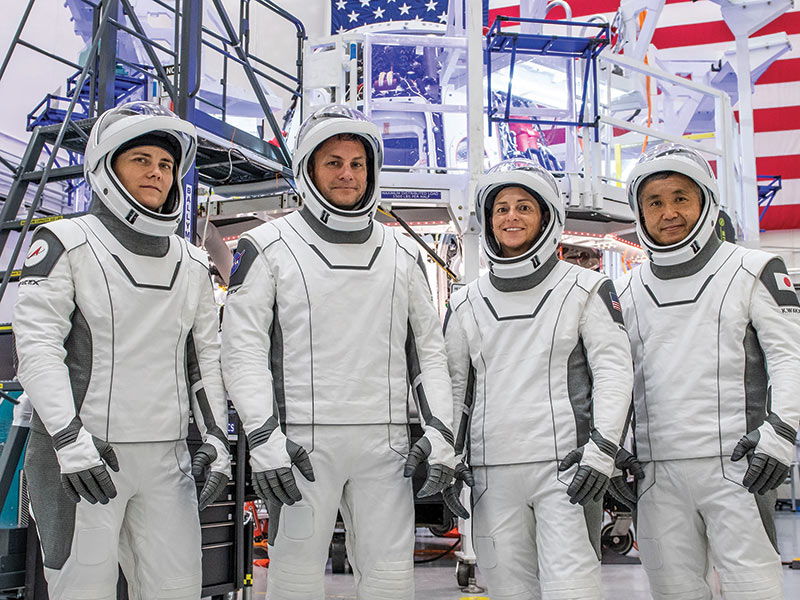 photo of University of Rochester alumnus Josh Cassada and other astronauts in spacesuits during training for their flight to the international space station