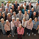 photo of members of the classes of 1972 from the University of Rochester posed together