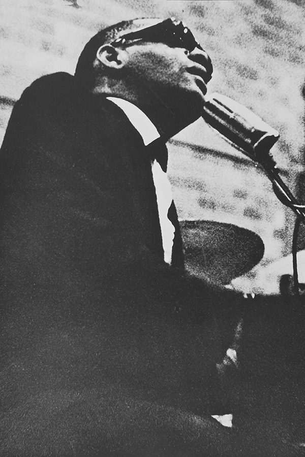 photo of musician Ray Charles playing the piano