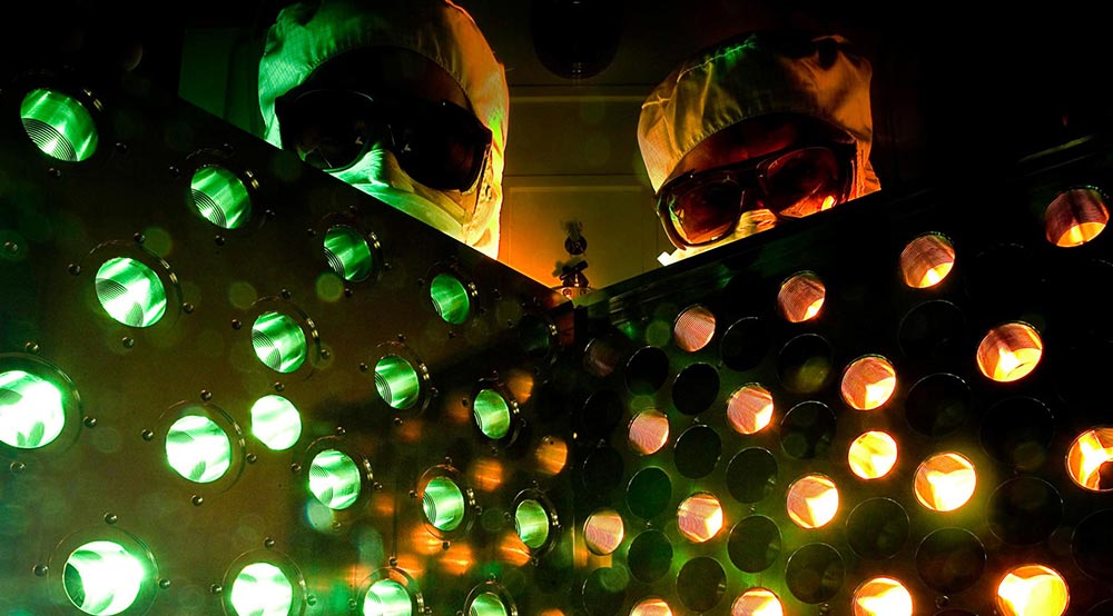 scientists wearing clean suits